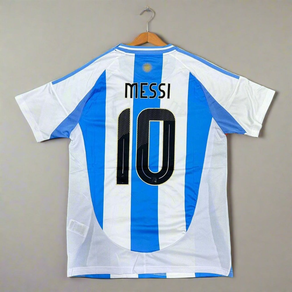 Argentina Messi 10 football t shirt with blue and white stripes on hanger.